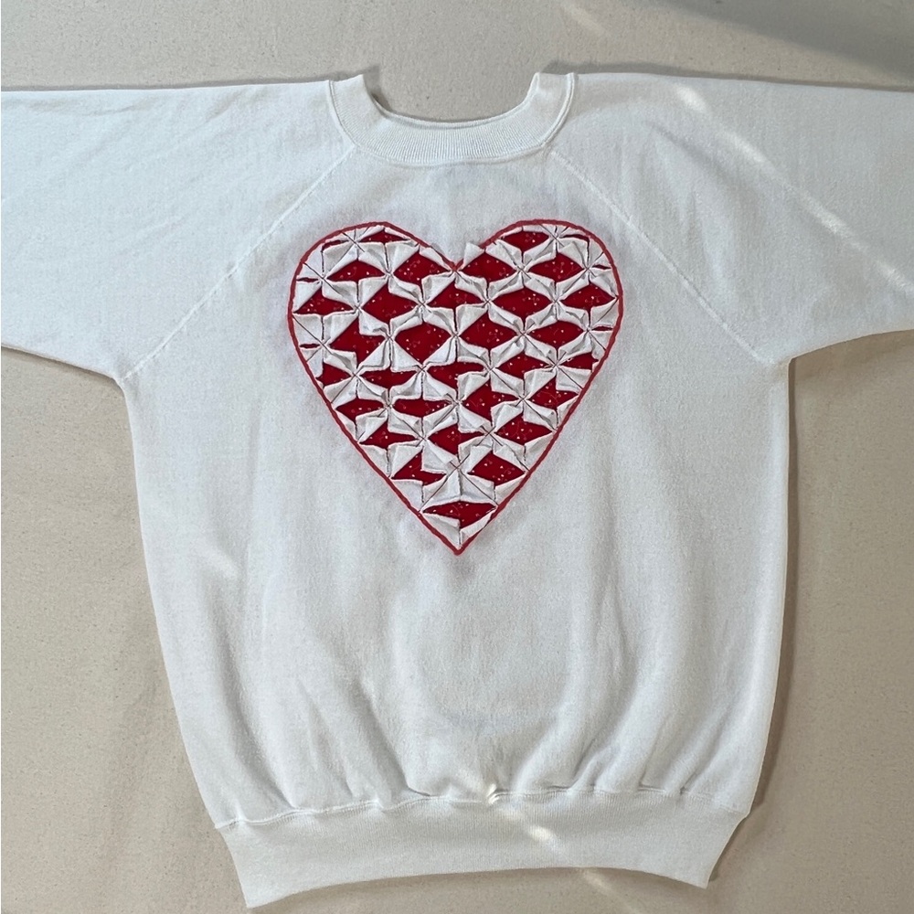 White Sweatshirt with Red Heart Design